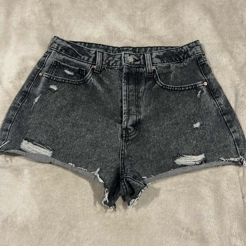 Black jean shorts with Light distressing
